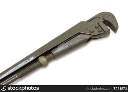 The big metal wrench for untwisting of pipes on a white background