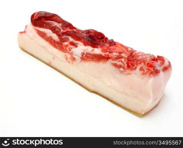 The big piece of fresh fat with a meat layer on a white background