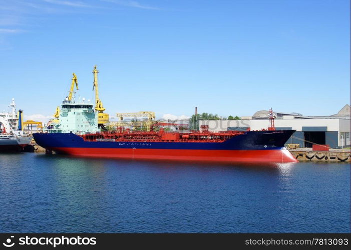 The big tanker on a background of the blue sky