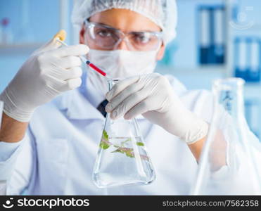 The biotechnology concept with scientist in lab. Biotechnology concept with scientist in lab