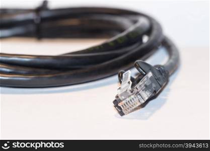 The black internet cable on white background