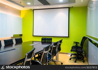 the blank display/projector display in the business meeting room