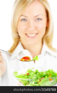 The blonde holds a plug with salad isolated
