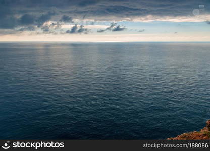 The blue sea and black storm clouds, the elements of a beautiful landscape