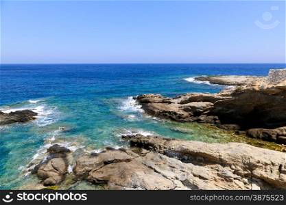 The blue see and rocks of Apollonas in Naxos