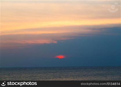 the blurred sun falling down arabian sea ocean in oman coastline
