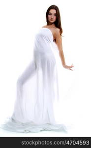 The body of a beautiful naked woman through the transparent fabric on a white background