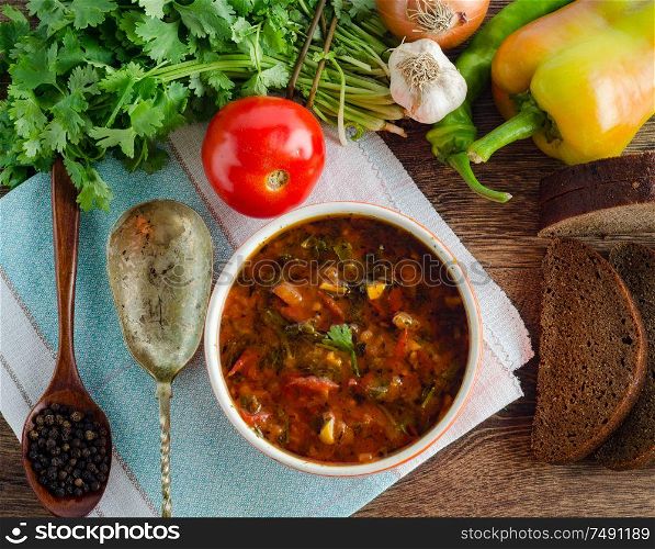 The bowl of traditional soup borscht on table. Bowl of traditional soup Borscht on table