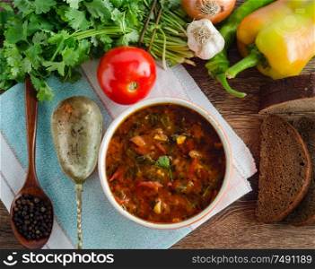 The bowl of traditional soup borscht on table. Bowl of traditional soup Borscht on table