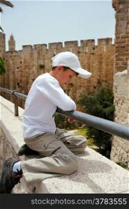 The boy on the wall in Jerusalem&rsquo;s Old City, near the tower of David.