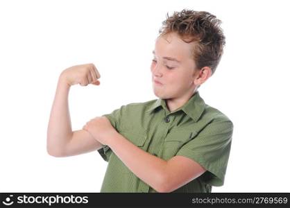 The boy shows his muscles. Isolated on a white background
