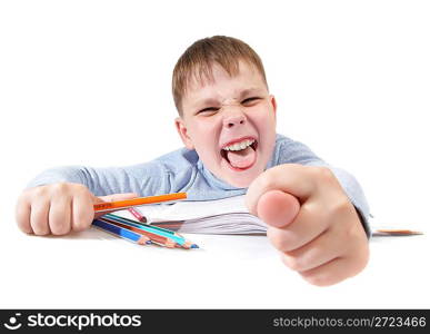 The boy with the book behind a table on a white background