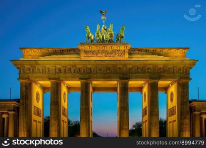 The Brandenburg Gate in downtown Berlin Germany at night