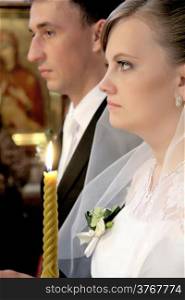 The bride and groom on ceremony of wedding. Shallow depth of field.