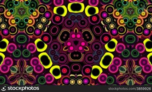 The bright color pattern consisting of rings flickers and changes in reflection of mirrors on a black background.