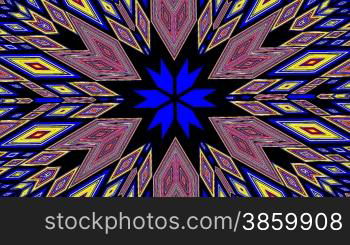 The bright color pattern in the form of a flower (star) rotates on a black background. It changes a form and colors.