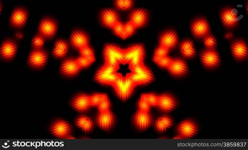 The bright red and yellow (fiery) flower (pattern) appears on a black background. Slowly rotates changing and disappears.