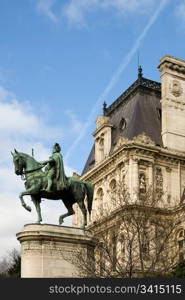 The bronze statue of Etienne Marcel proudly standing beside the Hotel de Ville, Paris, France