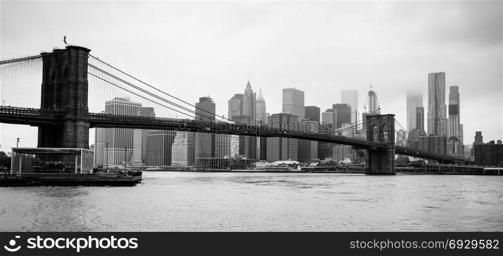 The Brooklyn Bridge spans the East River for travelers between Manhattan and Brooklyn