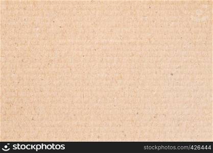 The brown paper box is empty, the corrugated surface of the abstract background.