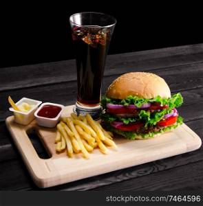 The burger served in bun in nutrition fast food concept. Burger served in bun in nutrition fast food concept