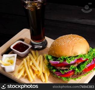 The burger served in bun in nutrition fast food concept. Burger served in bun in nutrition fast food concept