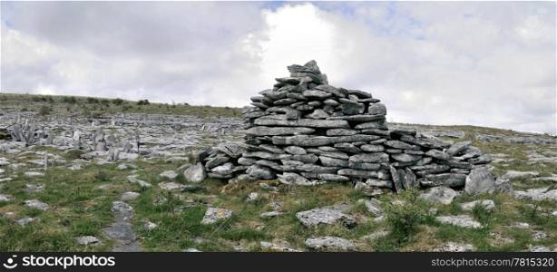 The Burren is a karst-landscape region in northwest County Clare, in Ireland. Dolmen