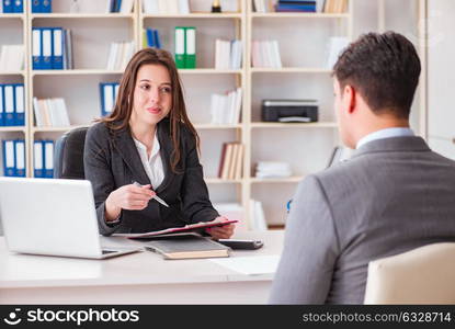 The business meeting between businessman and businesswoman. Business meeting between businessman and businesswoman