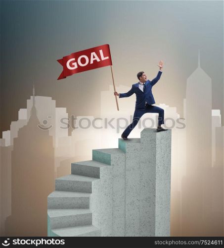 The businessman achieving his business goal objective. Businessman achieving his business goal objective