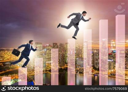 The businessman climbing bar charts in growth concept. Businessman climbing bar charts in growth concept