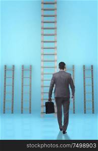 The businessman climbing career ladder in business success concept. Businessman climbing career ladder in business success concept