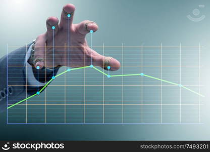 The businessman controlling the market with strings. Businessman controlling the market with strings