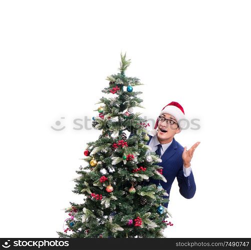 The businessman decorating christmas tree isolated on white. Businessman decorating christmas tree isolated on white