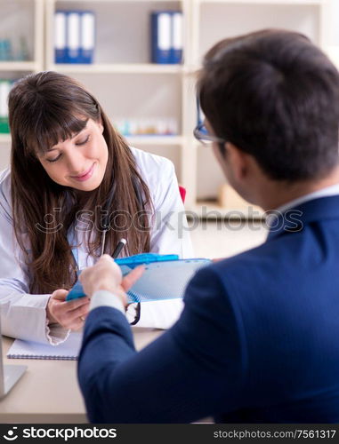 The businessman discussing health issues with doctor. Businessman discussing health issues with doctor