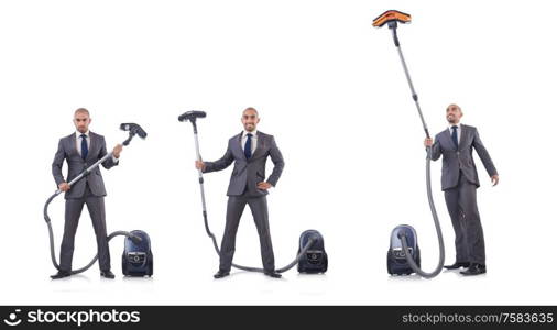 The businessman doing vacuum cleaning on white. Businessman doing vacuum cleaning on white