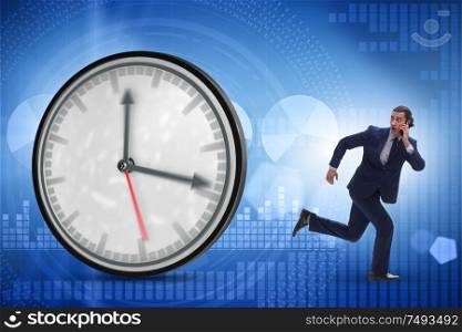The businessman employee in time management concept. Businessman employee in time management concept