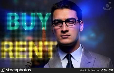 The businessman facing dilemma of buying versus renting. Businessman facing dilemma of buying versus renting