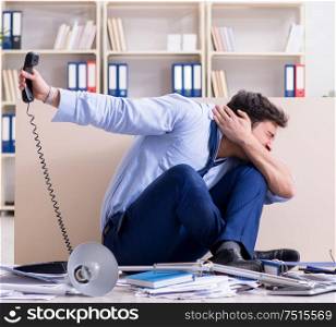 The businessman frustrated at many telephone calls. Businessman frustrated at many telephone calls