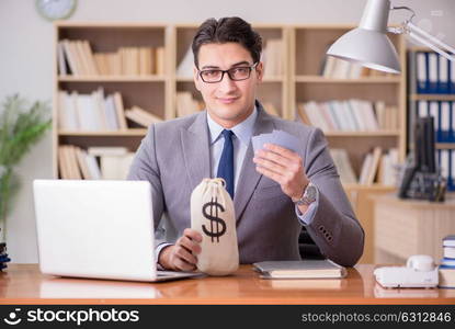 The businessman gambling playing cards at work. Businessman gambling playing cards at work