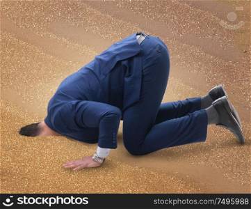 The businessman hiding his head in sand escaping from problems. Businessman hiding his head in sand escaping from problems