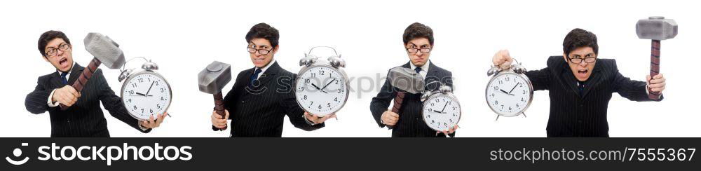 The businessman holding hammer and alarm clock isolated on white. Businessman holding hammer and alarm clock isolated on white