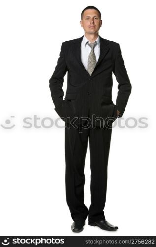The businessman in a black suit. It is isolated on a white background