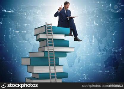 The businessman in education and learning concept. Businessman in education and learning concept. The businessman in education and learning concept