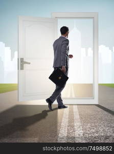 The businessman in front of door in business opportunities concept. Businessman in front of door in business opportunities concept