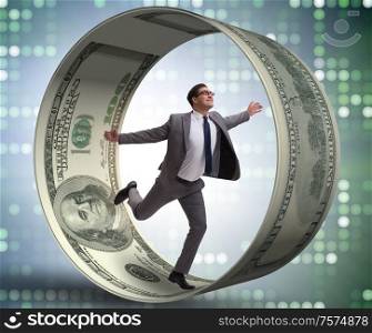 The businessman in hamster wheel chasing dollars. Businessman in hamster wheel chasing dollars