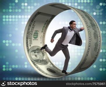 The businessman in hamster wheel chasing dollars. Businessman in hamster wheel chasing dollars