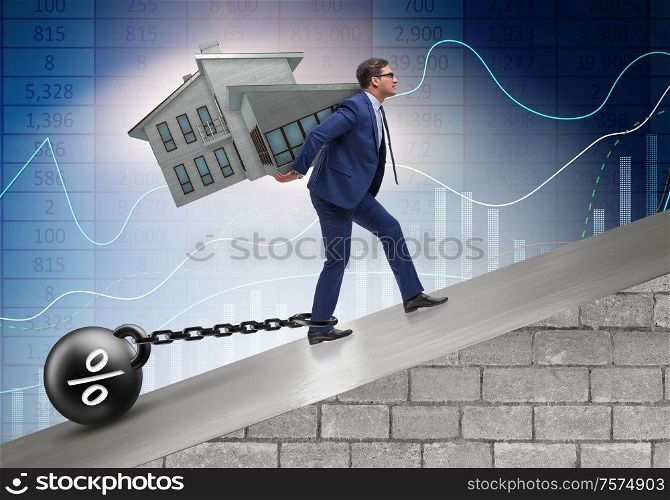The businessman in mortgage debt financing concept. Businessman in mortgage debt financing concept