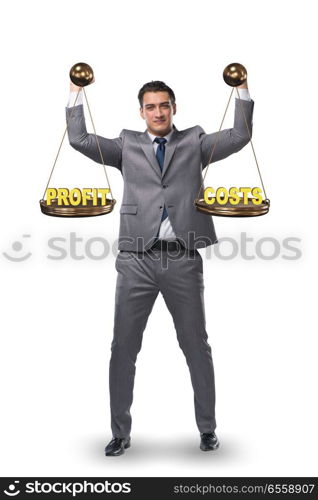 The businessman in profit benefit balance concept. Businessman in profit benefit balance concept. The businessman in profit benefit balance concept