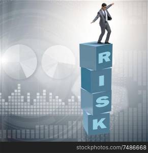 The businessman in risk and reward business concept. Businessman in risk and reward business concept