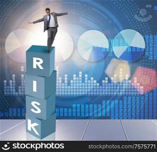 The businessman in risk and reward business concept. Businessman in risk and reward business concept